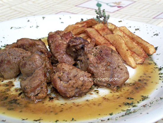 Fried Pork in a herbs and mustard sauce Fried Pork in a herbs and mustard sauce