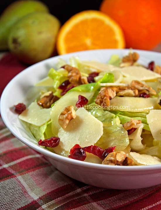 Crunchy and sweet salad with iceberg, cranberries and parmesan Crunchy and sweet salad with iceberg, cranberries and parmesan