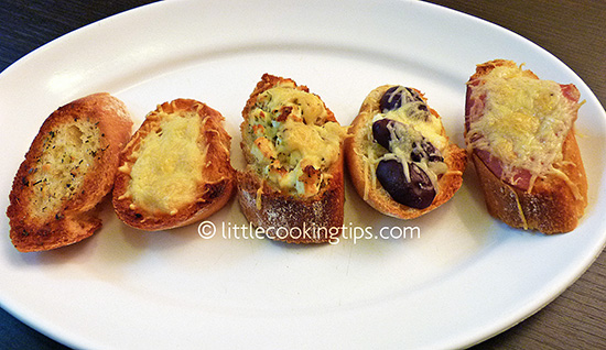 A tasty variety of garlic bread A tasty variety of garlic bread